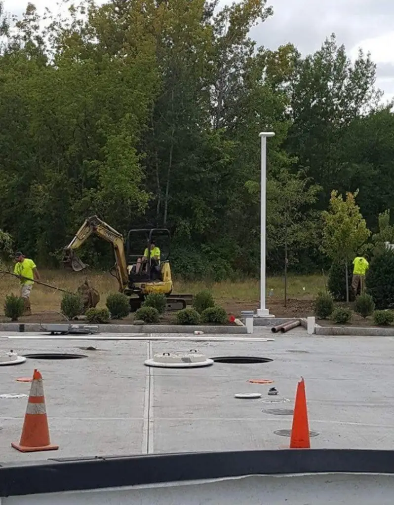 Parking lot site work with cones by Josh Field Landscaping